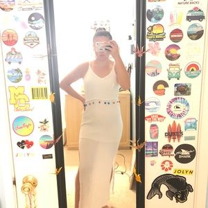 White dress with colored Pom Pom balls